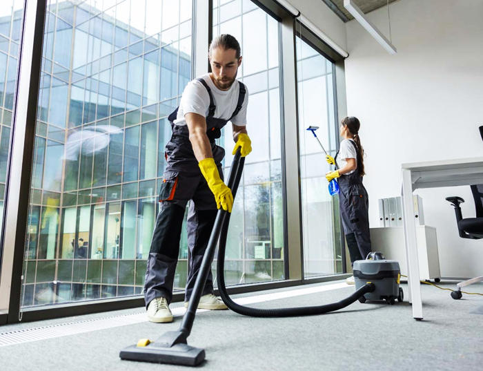 Corporate office cleaning team servicing a multi-floor workplace
